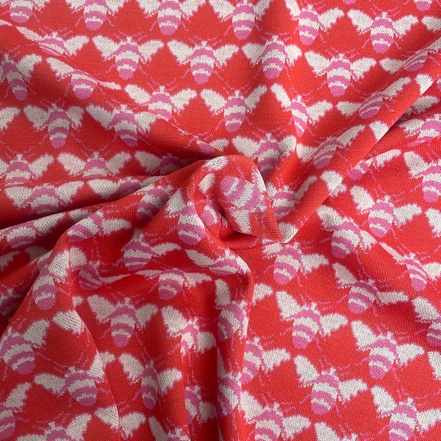 Red & Pink Bee Print Jersey Knit Deadstock Fabric