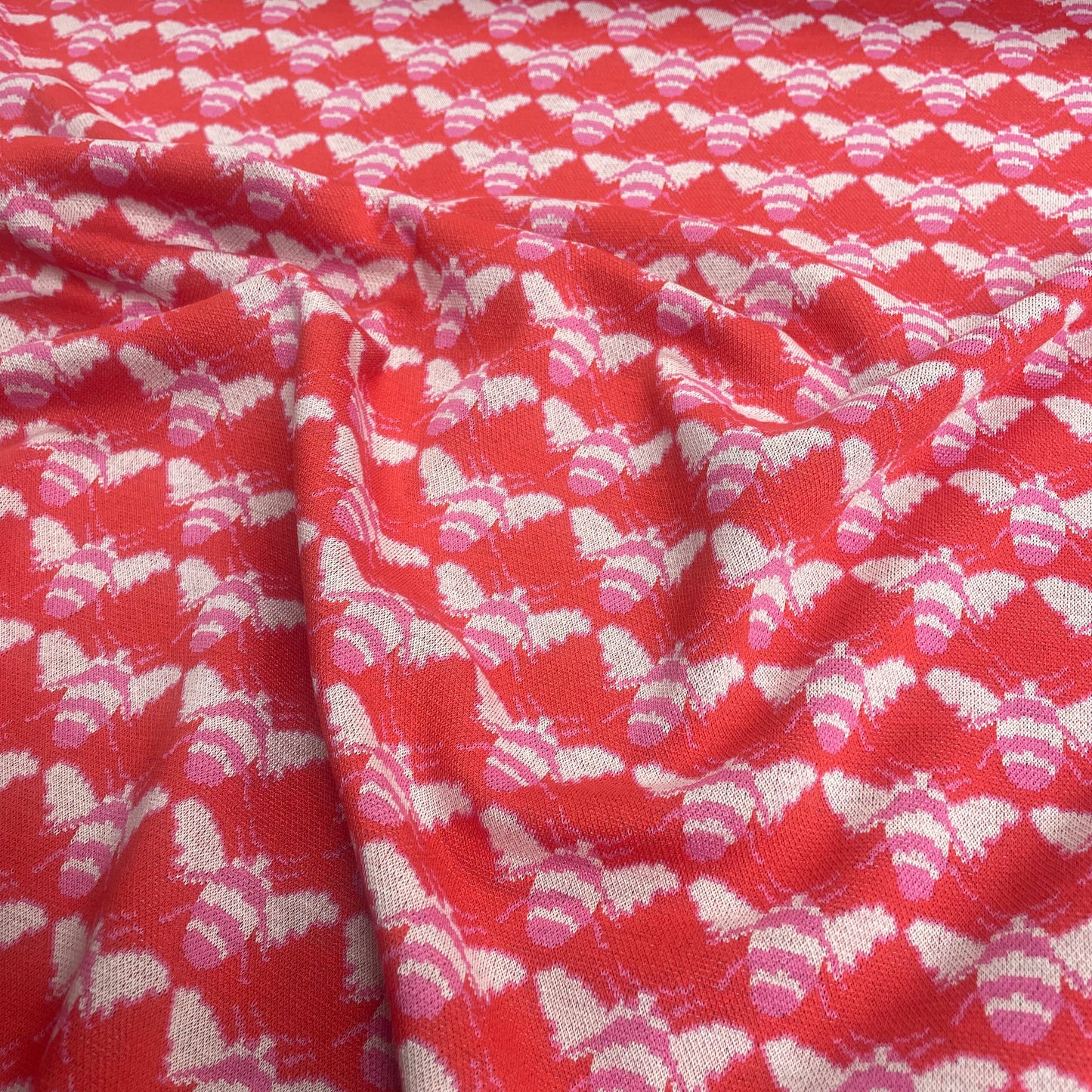 Red & Pink Bee Print Jersey Knit Deadstock Fabric