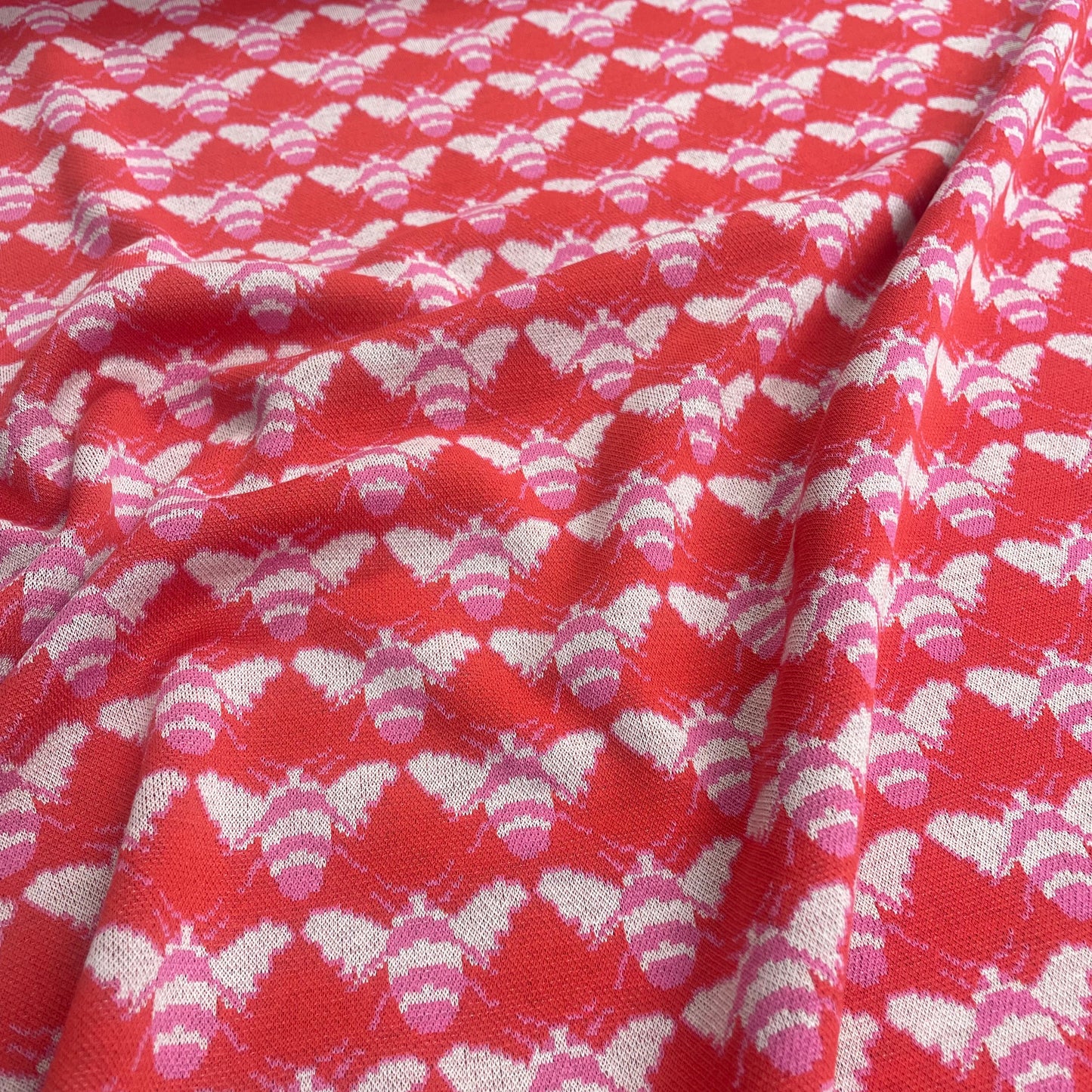 Red & Pink Bee Print Jersey Knit Deadstock Fabric