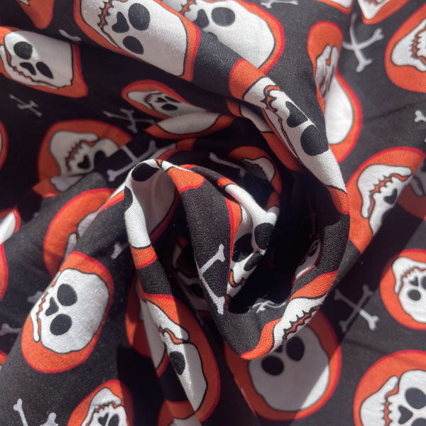 Deadstock Orange, Black & White Skull Circle Print Cotton Fabric