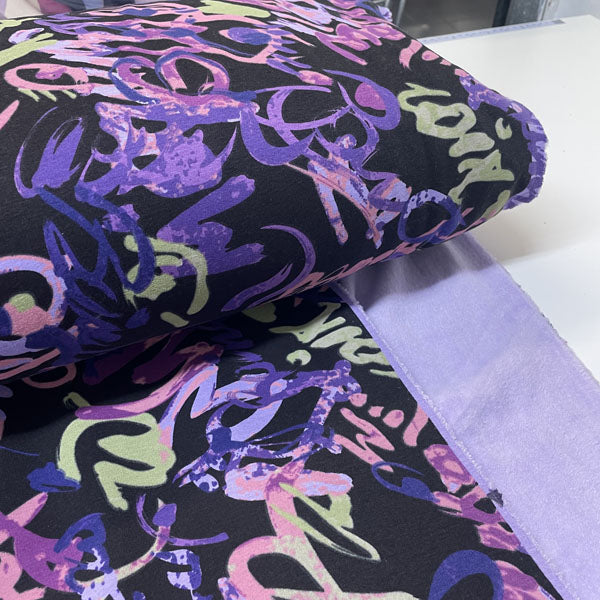 Deadstock Purple Doodles Alpine Fleece Backed Sweatshirting Fabric