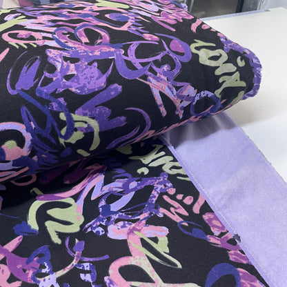 Deadstock Purple Doodles Alpine Fleece Backed Sweatshirting Fabric